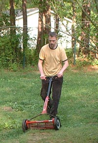 the author mowing the yard